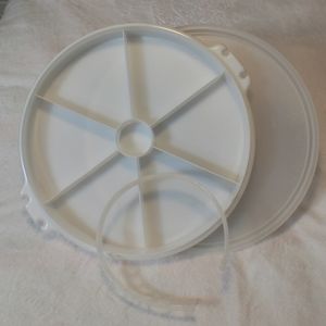 Large Tupperware container with lid and handle